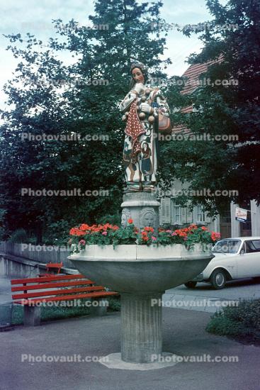 Narro statue, flowers, representing Fasnet, Donaueschingen, Donaueschingen