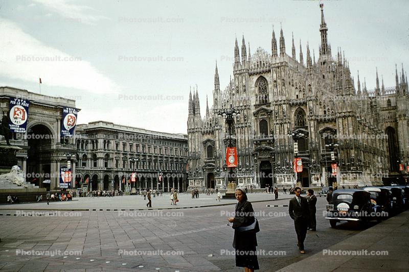 Milan Cathedral (Italian: Duomo di Milano), cars, taxi, women, building, 1950s