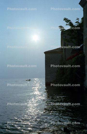 Castle, sun, boat, San Vigilio