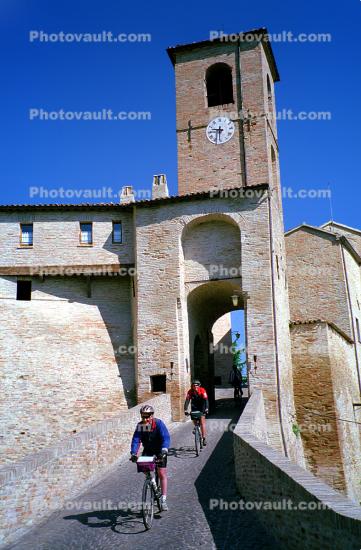 outdoor clock, outside, exterior, building, tower, tunnel, narrow street