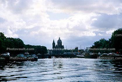 Church of Saint Nicholas, (Sint Nicolaaskerk), Canal, Waterway, boats, Amsterdam, 1950s