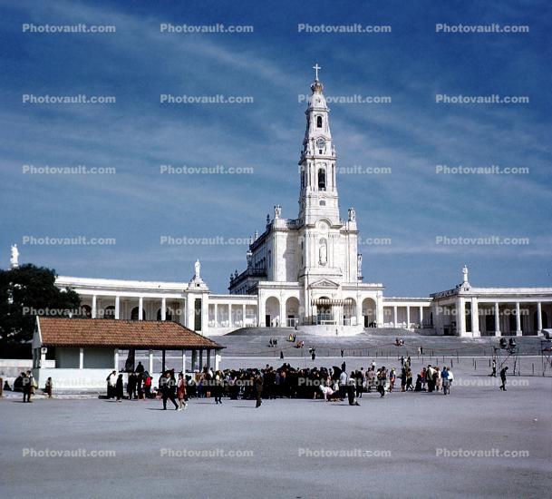 The main Church, Basilica of Our Lady of the Rosary, Cathedral, tall steeple, white tower, building