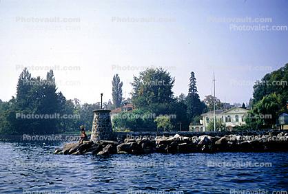 Lake, lighthouse, rocks, jetty, houses, Switzerland