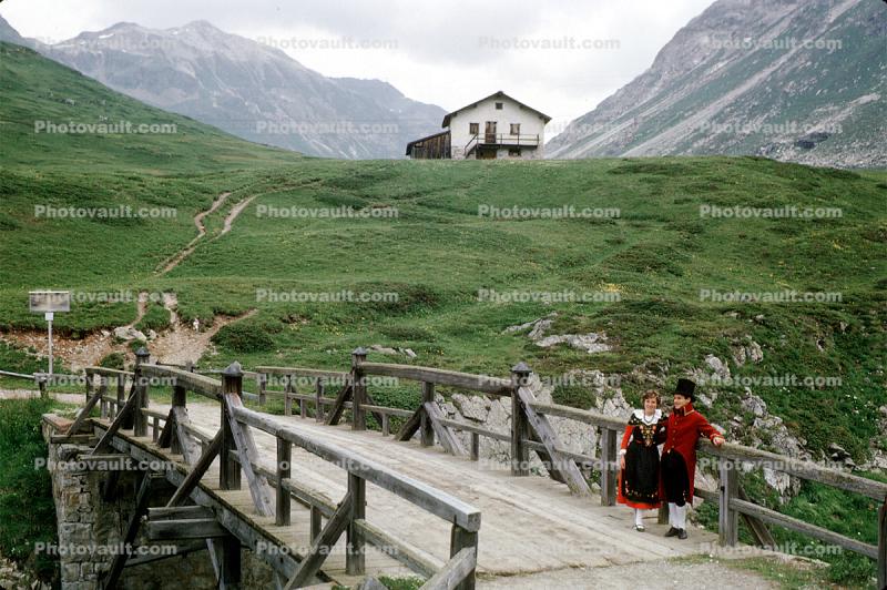 Boy and Girl in Traditional Costume, Wooden Bridge, Road, Switzerland