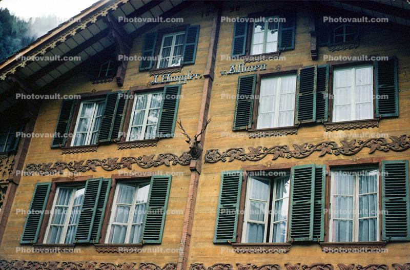 Wooden Building, Home, Windows, Antlers, Ornate, Switzerland, opulant