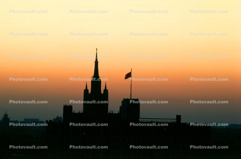Tall Tower, flag, sunrise