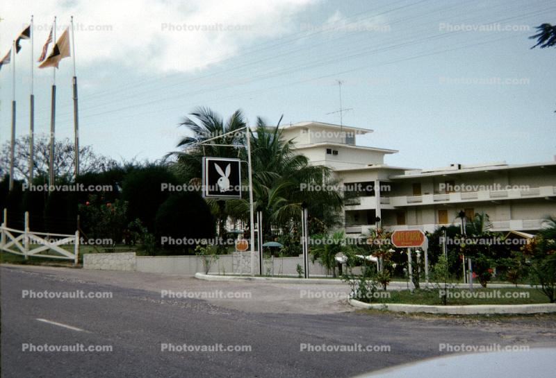 Cayman Playboy Club Resort, building, flags, bunny