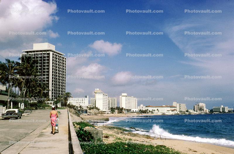 Beach, coastline, car, woman walking, Buildings