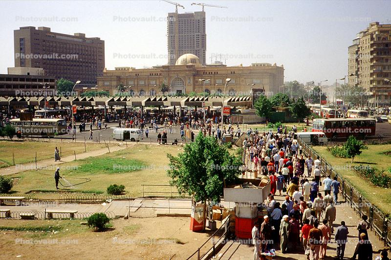 Bus Station, crowds, buildings, skyline, cranes, Cairo
