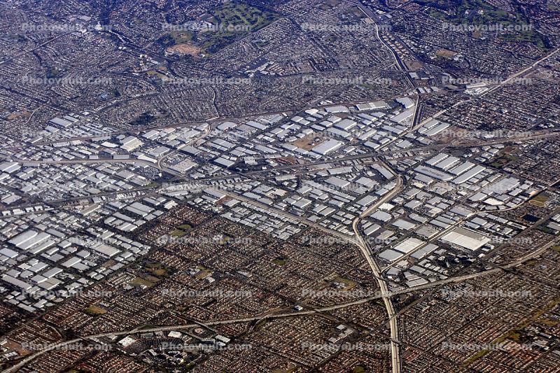 urban sprawl, warehouse buildings, freeway