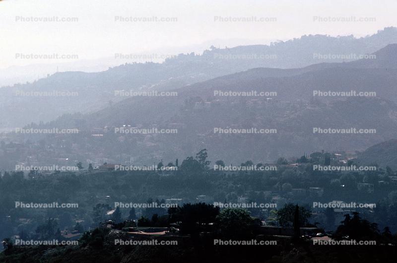 Smogy layered hills, smog, homes, houses