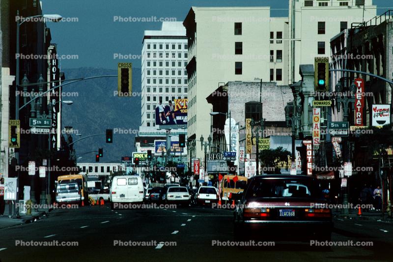 cars, downtown shops, stores, seedy, skid row