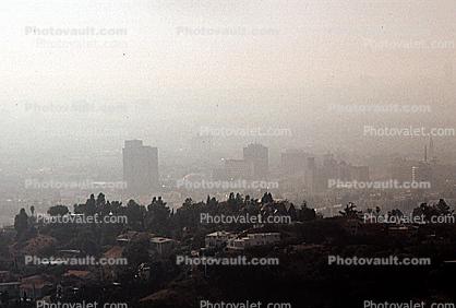 hills layered in smog, buildings, haze, air pollution, homes, houses, Dystopia