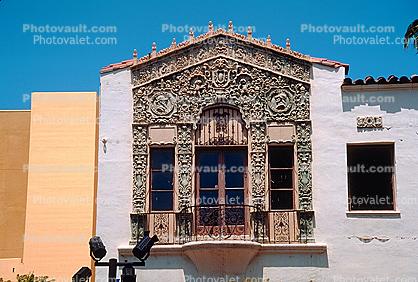 Spanish Colonial Revival commercial building, floral motifs, scrollwork, Churrigueresque ornamentation