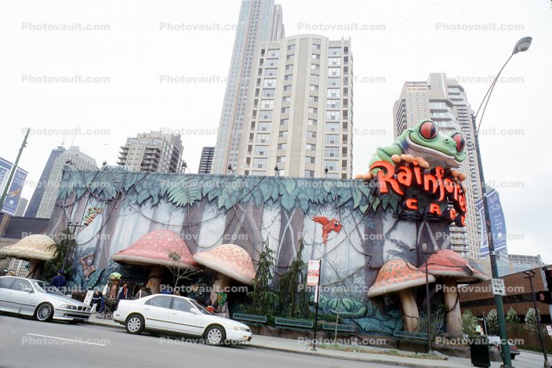 Rainforest Cafe, building, mushrooms, smiling frog, cars