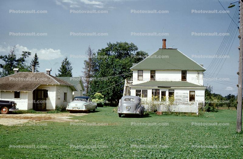 Homes, houses, rural, cars, 1950s
