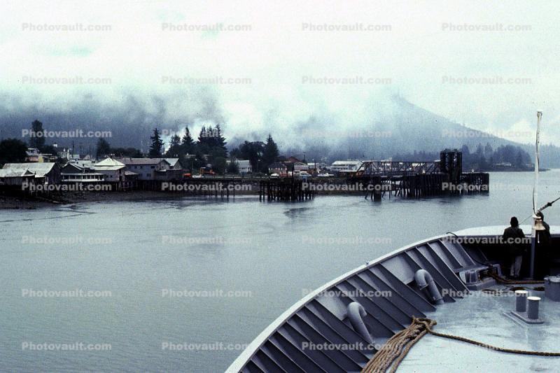 Pier, buildings on stilts, reflection, harbor