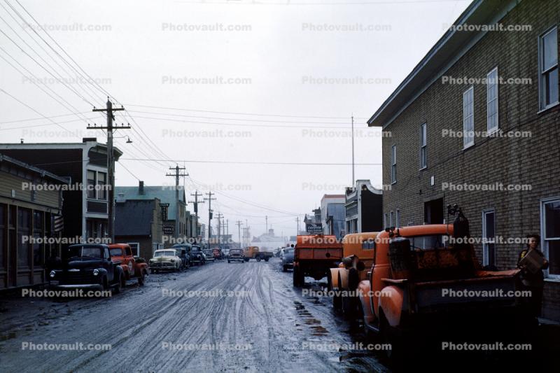 Downtown Valdez, cars, trucks, muddy road, pickup truck, buildings, rain, rainy, August 1952, 1950s