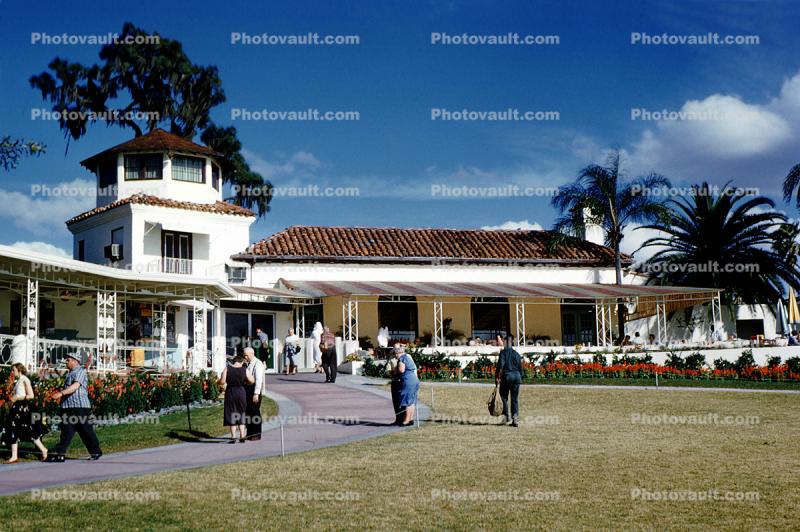 Building, lawn, People, path, Palm Trees