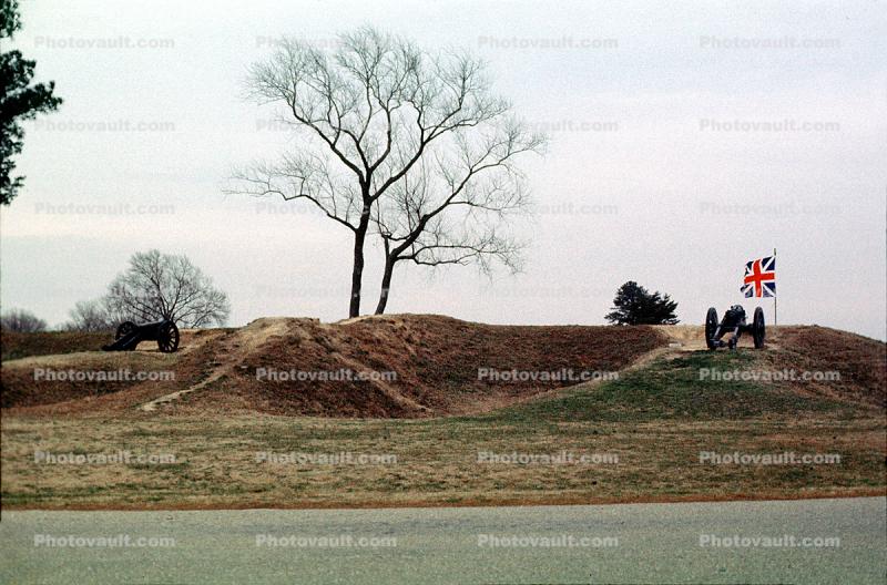 Cannon, British Flag, mounds, Yorktown Battlefield
