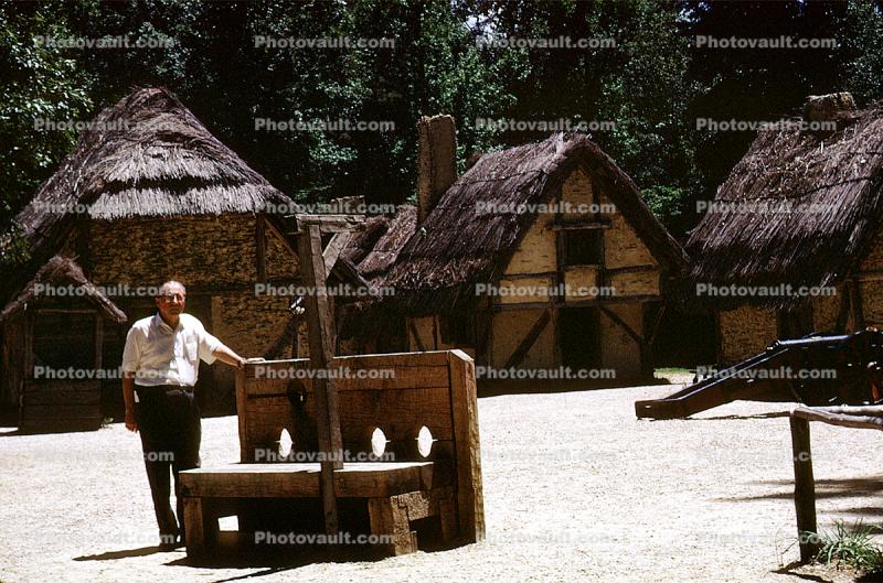 Stocks, thatched roof houses, buildings, homes, Jamestown, Sod