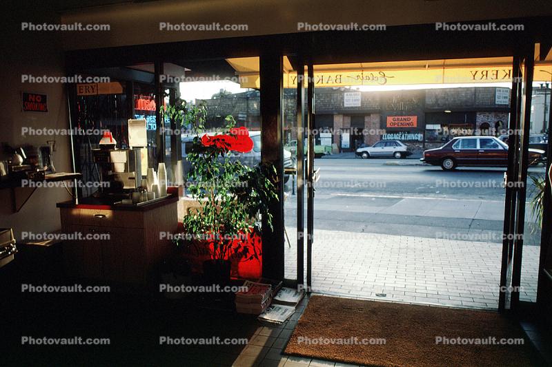 Eclair Bakery, inside looking out, cars, buildings, mat, store