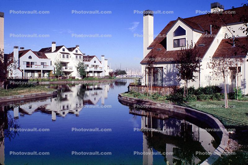 Homes, water, reflection