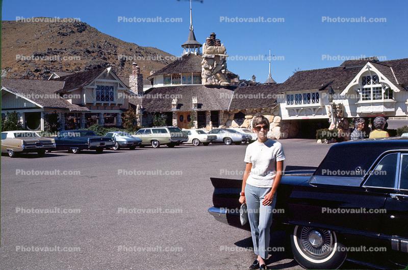 Lady next to her Ford Thunderbird, Madonna Inn Hotel, December 1969