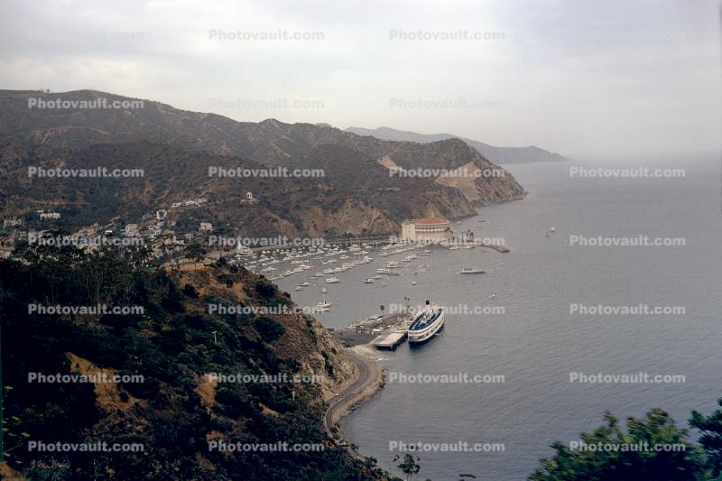 Avalon Harbor, SS-Catalina, Cliffs, shoreline, coast, coastal, hills, town, dock