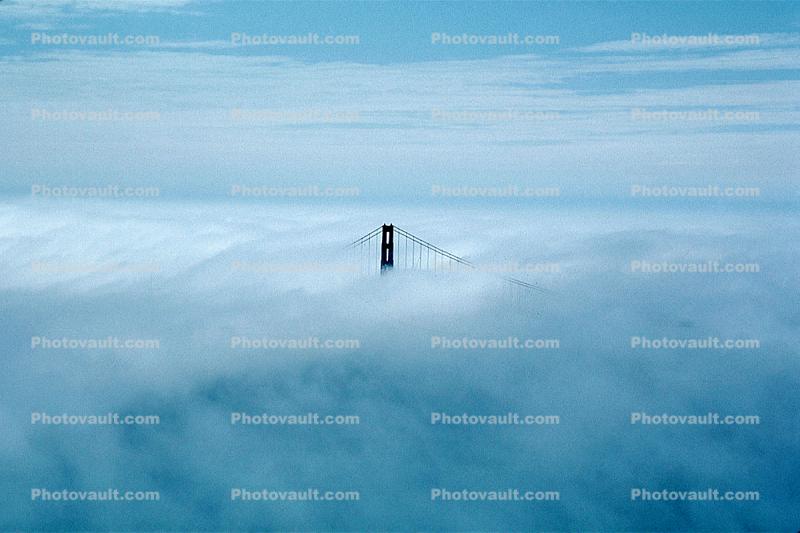 Golden Gate Bridge floating in the Fog