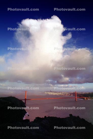 Golden Gate Bridge under a rain cloud