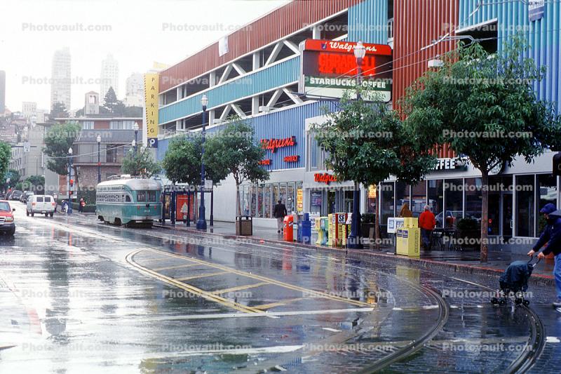Trolley Stop, Parking Garage, buildings, street, tracks, rain, wet