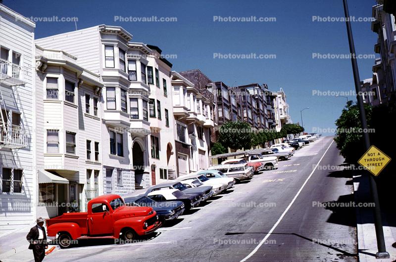 Cars parked on a steep hill, homes, houses, July 1969, 1960s