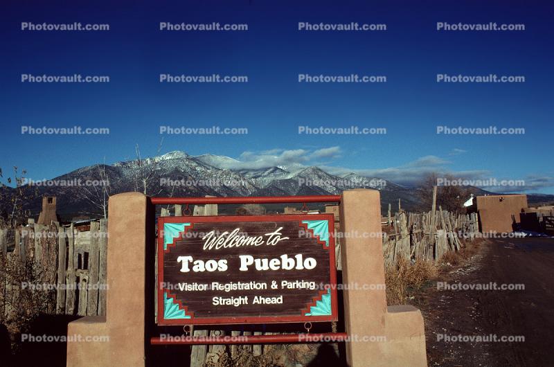 Welcome to Taos Pueblo signage, Sangre De Cristo Mountain Range