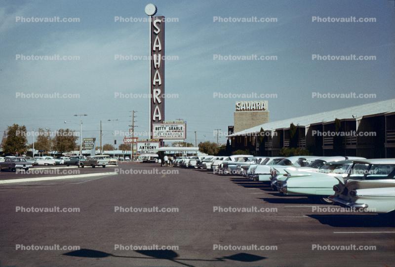 Betty Grable headline, Sahara Casino, building, cars, parking lot, 1950s