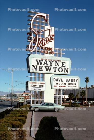 Sands Hotel Sign, Wayne Newton Marquee, cars