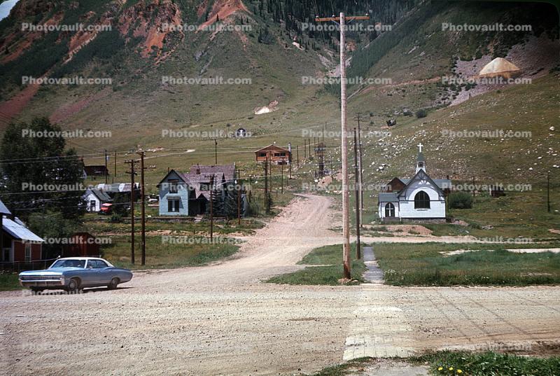 church, dirt road, car, dust, homes, houses, vehicles, Automobile, July 1969, 1960s