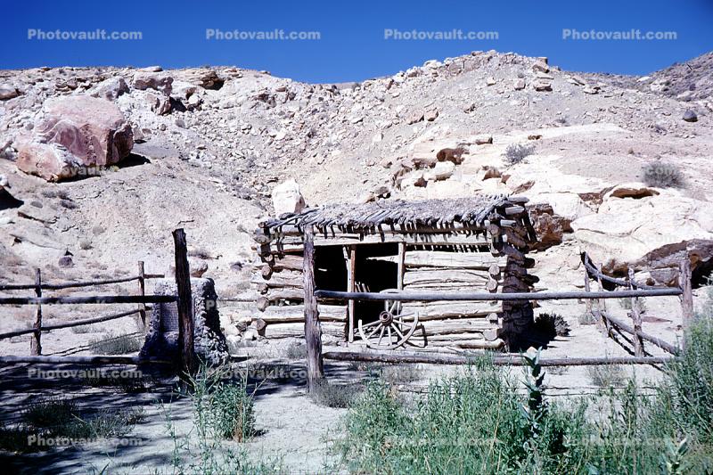 wagon wheel, Log Cabin, building, fence, hill, boulders, hut, homestead, Dirt, soil, cartwheel, wagonwheel