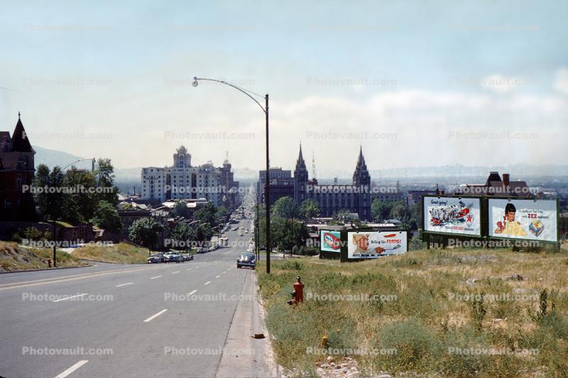Salt Lake City skyline, Advertising Billboards, cars, street, Temple, buildings, 1950s