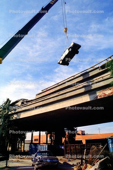 Lifting a Destroyed Car, pancake collapse, Loma Prieta Earthquake, (1989), 1980s