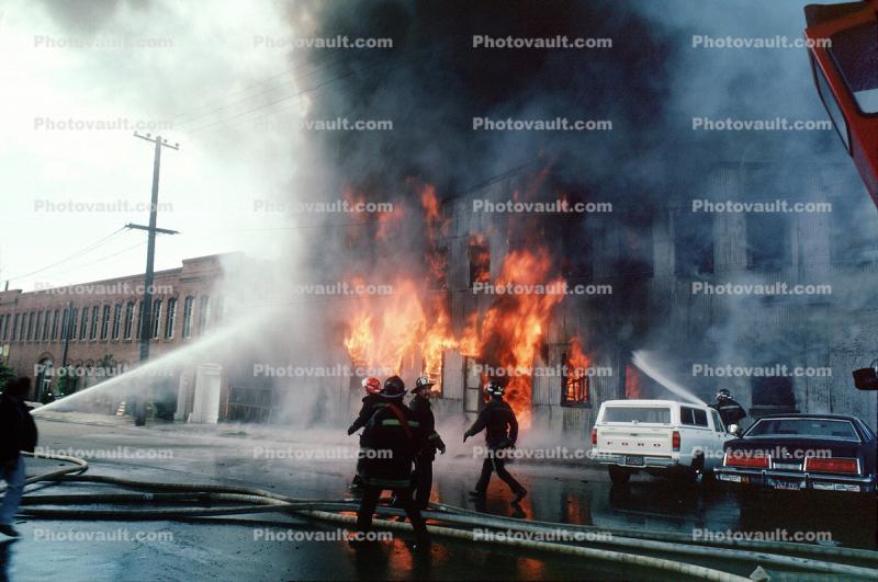 Flames, cars, hose, Thick Black Smoke, Mission District
