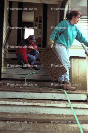 a flooded house, cleaning, flood, steps, hose, Sonoma County, 15 January 1995