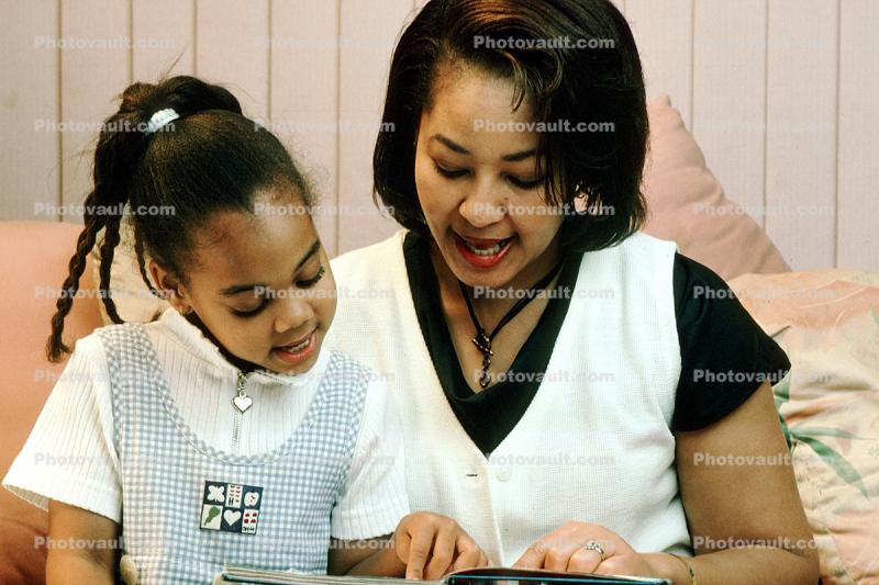 Mother reading to Daughter