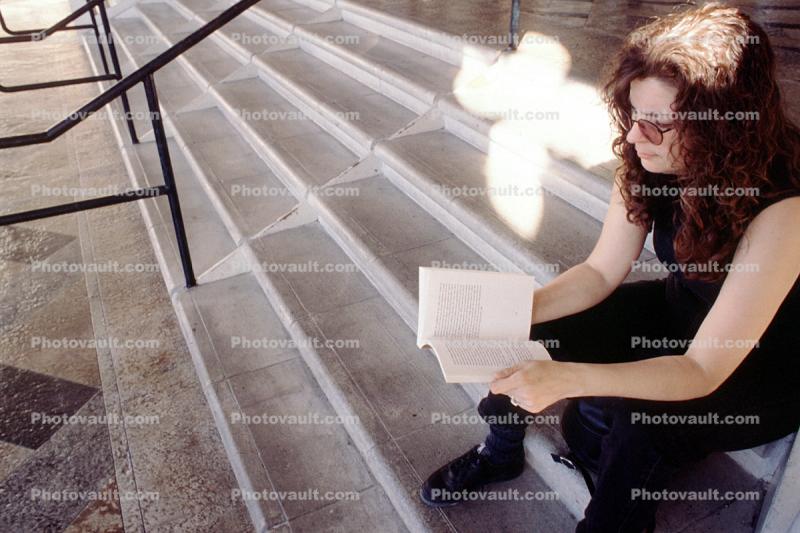 Woman Reading on steps