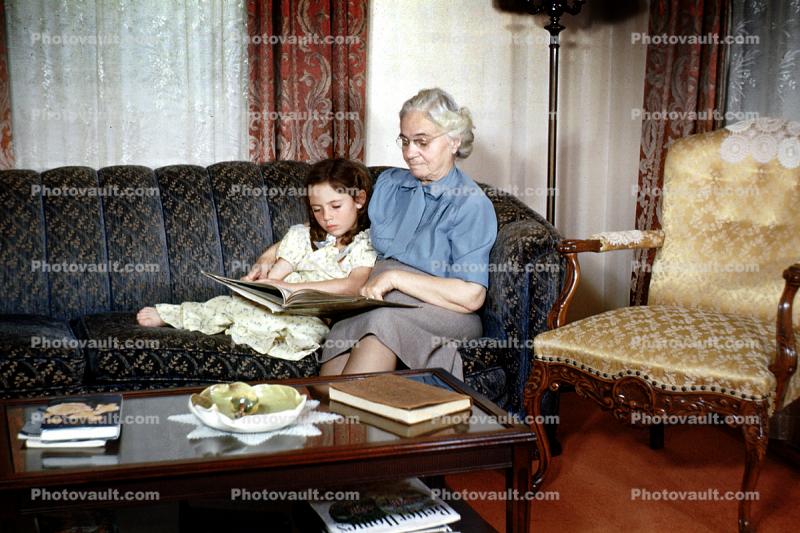 Grandmother, Grandaughter, Reading, Coffee Table, Sofa, 1940s