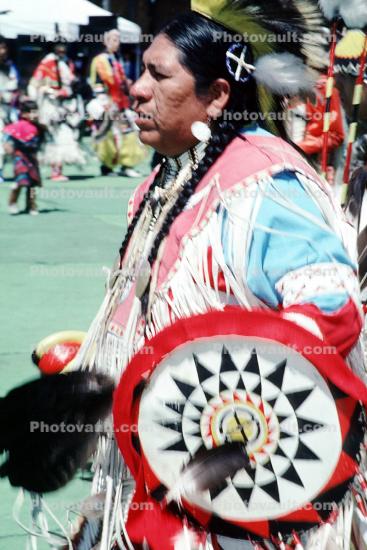 Male Dancer, ethnic costume, headdress, feathers, warbonnet