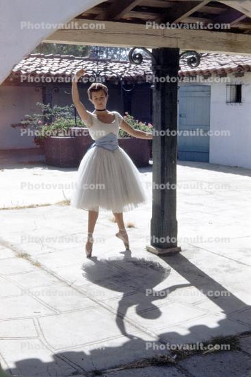 Ballerina Practicing in a White Dress, 1950s