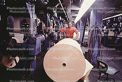 Paper rolls, Printing Press, worker