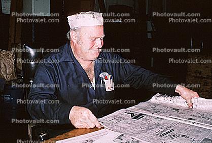 Newspaper Worker, Bundles of Newspapers, May 1984