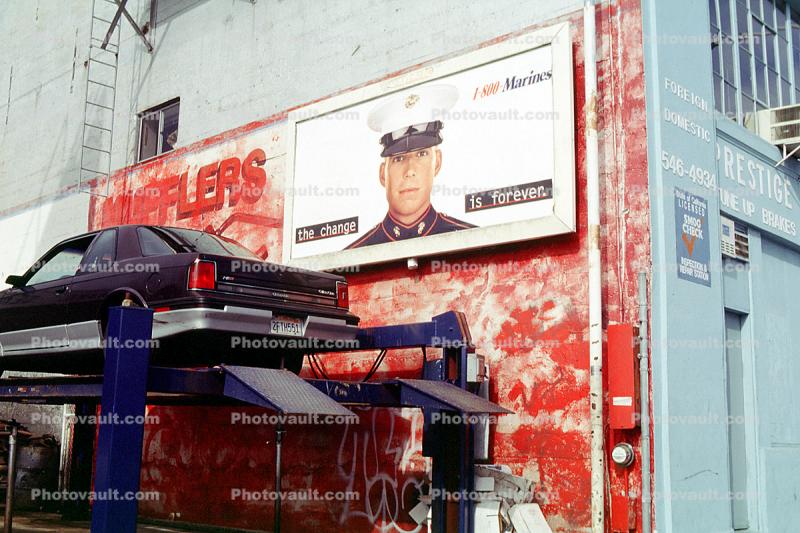 Marine Corps billboard, car